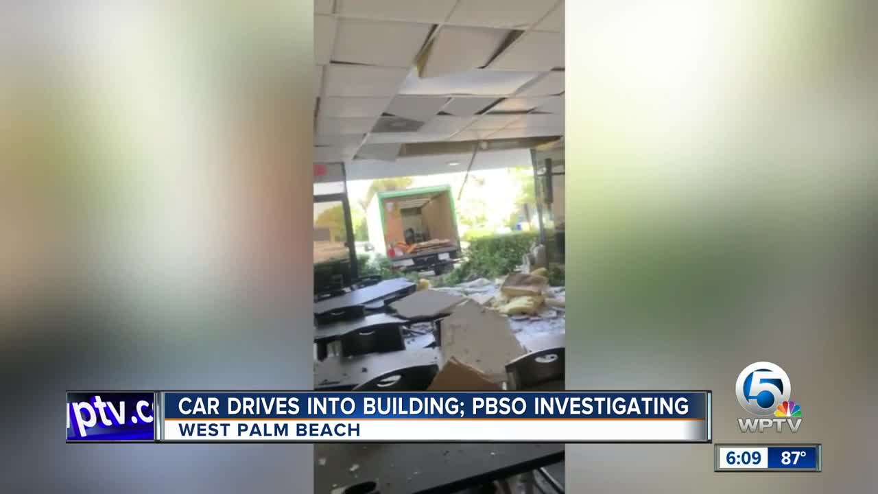 Car drives into building in West Palm Beach
