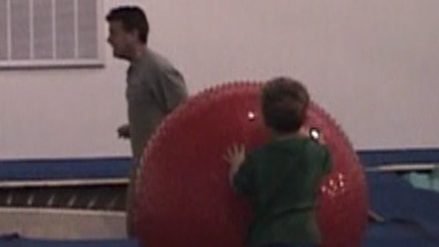 Son Trips Father On Trampoline