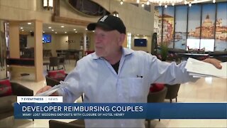 Buffalo developer Douglas Jemal gives reimbursement checks to couples who were supposed to be married at Hotel Henry