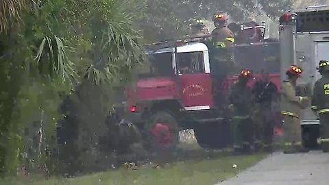 Brush fire threatening structures near Punta Gorda