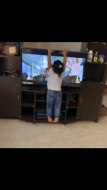 Baby girl smashed the TV while copying the movie dance