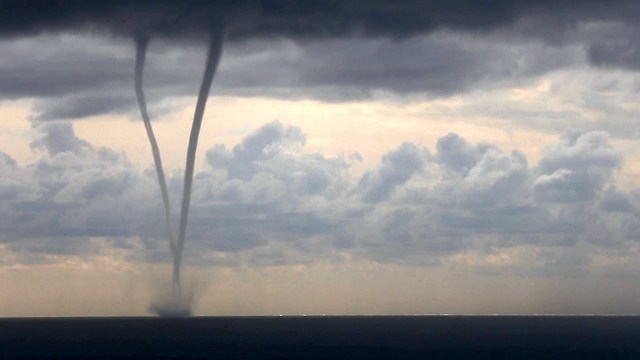 Rare Footage Of Waterspouts Stretching From Clouds To The Sea