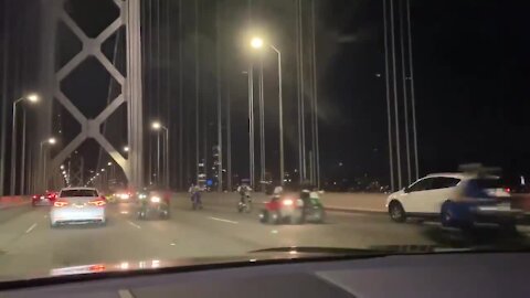 Bikers riding in the wrong direction on the Golden Gate Bridge