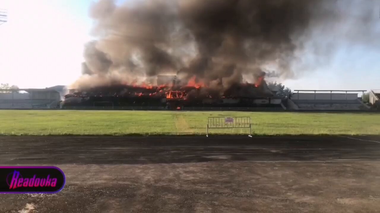 The main building at Pobeda stadium in Stakhanov caught fire after Ukrainian shelling yesterday