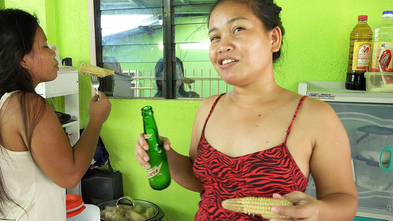 Filipina Wife and Sister Eat Corn and Drink Mountain Dew While Frying Cookies