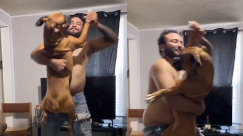 Guy dancing with his dog