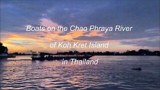 Boats on the Chao Phraya River of Koh Kret Island in Thailand