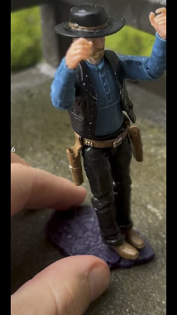 Clay takes a minute to do some singin in the rain