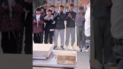 Guy destroys brick with bare hands