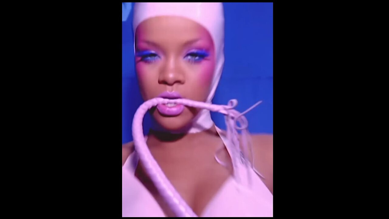 Rhianna and Catwoman (Halle Berry)! Whiping it good!