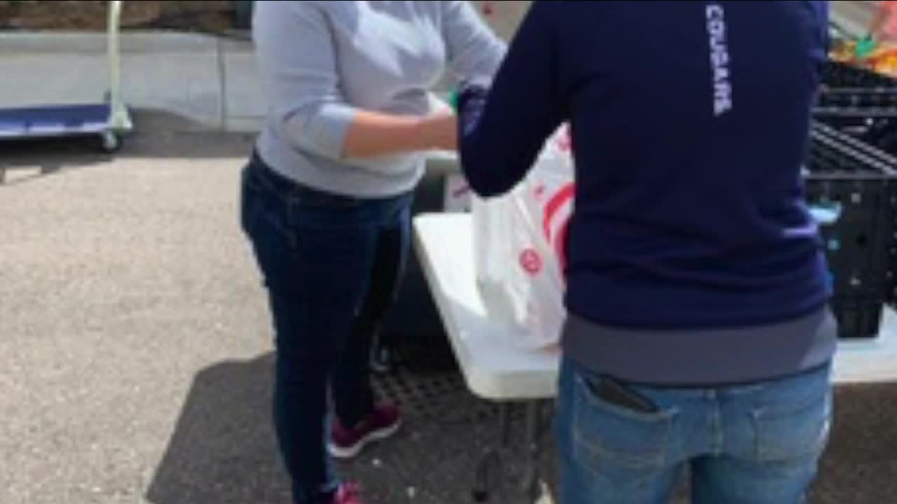 Food for Hope packing emergency food bags for families