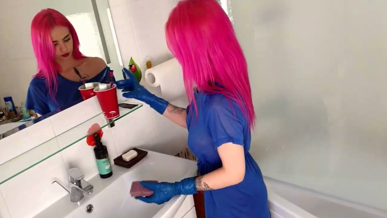 beautiful girl Bathroom cleaning in transparent shirt