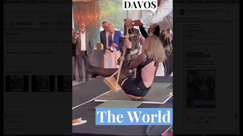 Davos this year is presenting a very peculiar "art". At least she's wearing a mask.