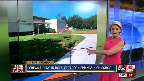 Officials investigating what caused a large hole to open up on Tarpon Springs High School campus