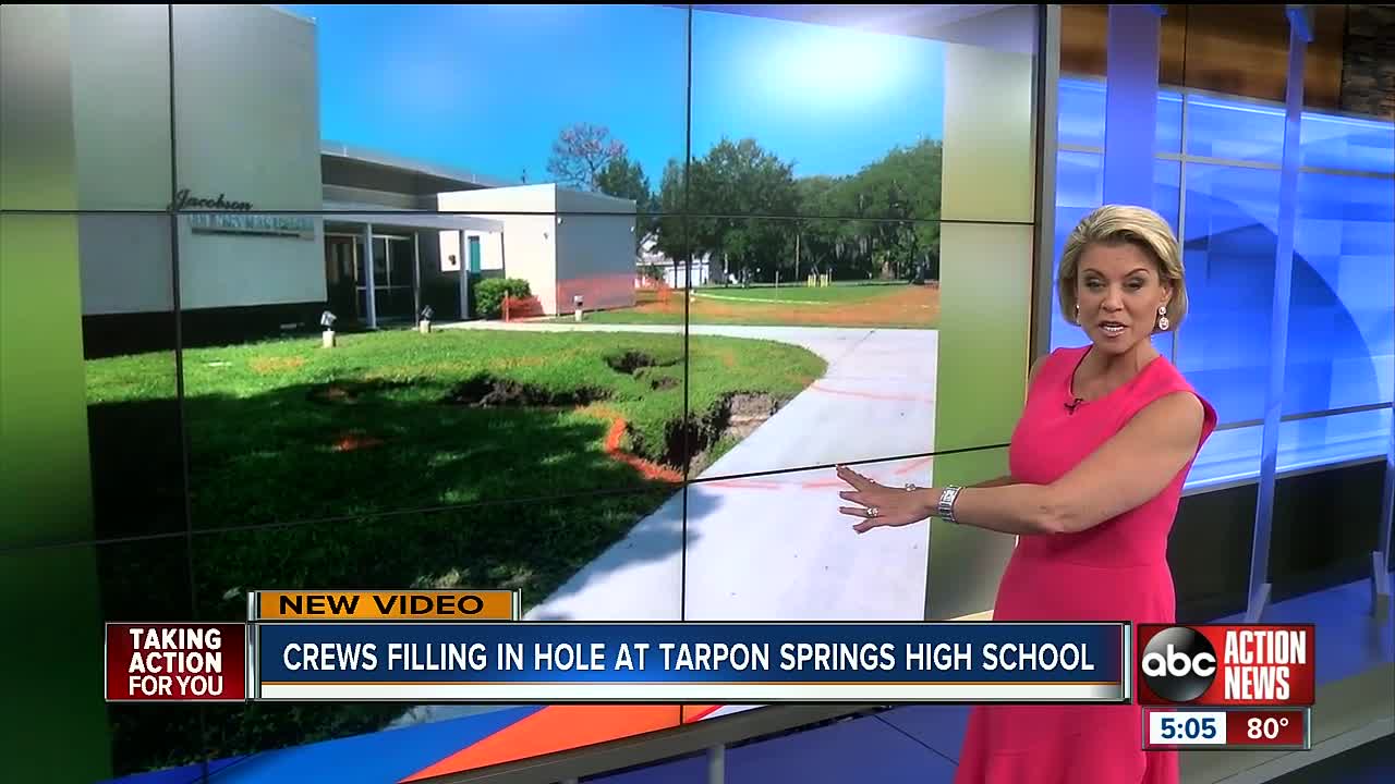 Officials investigating what caused a large hole to open up on Tarpon Springs High School campus