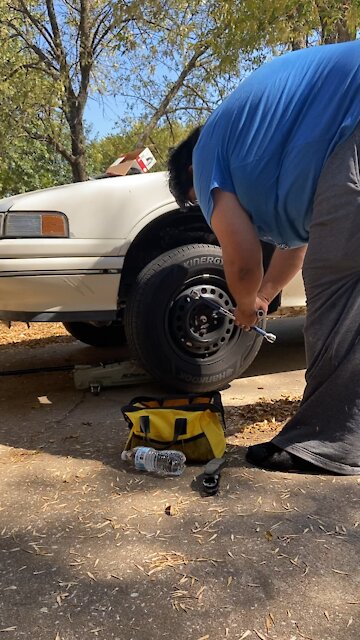 Tulsa Celebrity changing his own brakes