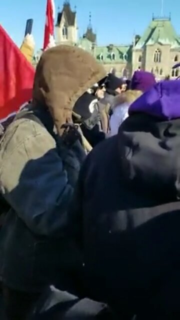 Crowd booing confederate flag in Ottawa