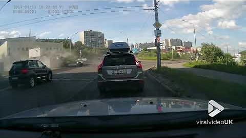 Dump truck rolls over at intersection