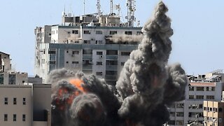 Israeli Strikes Kill 10 In Refugee Camp, Topple News Media Building