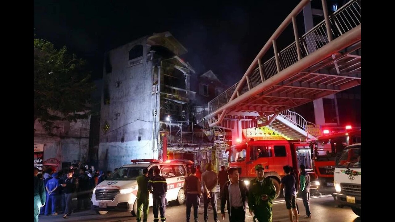 Firefighters at the scene after blaze at cafe in Vietnam kills eleven people