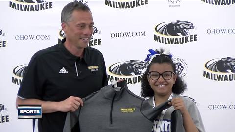 Jordan Moore signs with UWM at age nine