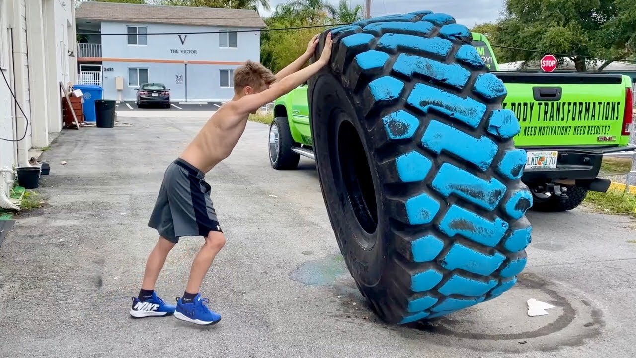 World Strongest 10-Year Old Kid Pushes a Truck!.