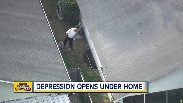 Large depression threatens homes in New Port Richey