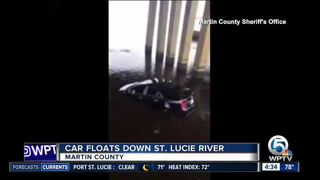 Car floats down St. Lucie River