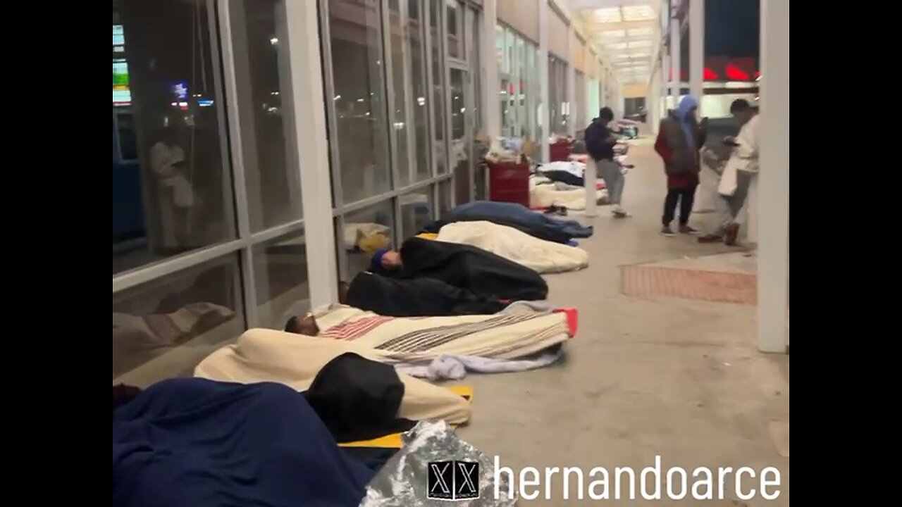 Dozens of illegals sleeping in a shopping center