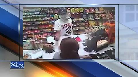 Green Bay Police release photos of liquor store armed robbery suspect