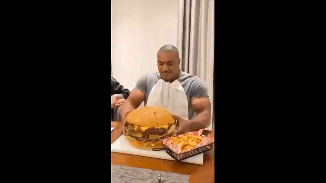 guy eating giant cheeseburger gif