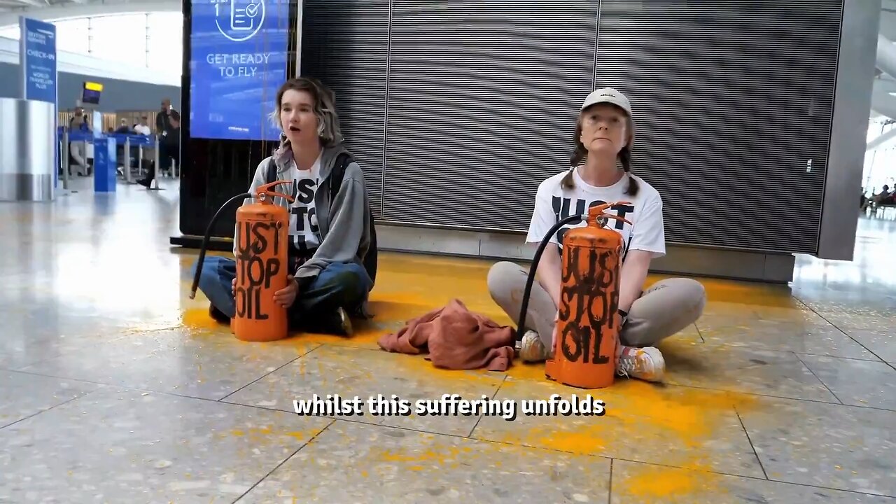 2 Climate Activists Crying and Screaming in a Lobby