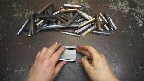 Damascus steel from two tape measures and 100 blades of stationery knives-4