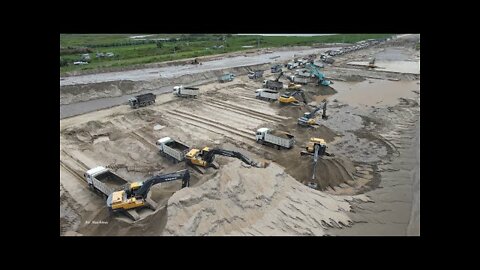 Beautiful excavator loading and Dump truck