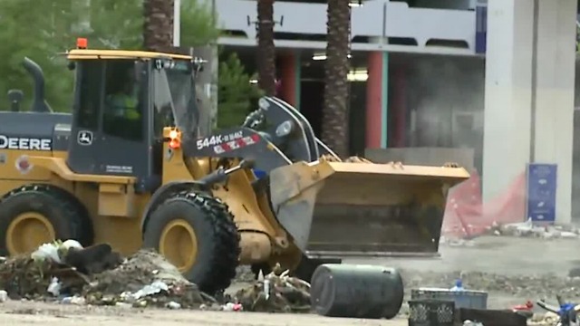 Crews clean up after flooding at the Linq