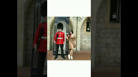 Adah Sharma dancing on “Shake It Like Shammi” alongside a British guard