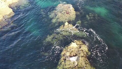 Coastal Splendor: Discovering Looe's Rocky Bay and Town Beach