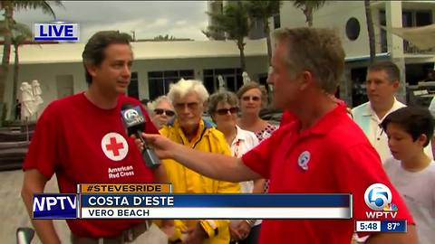Steve Weagle interviews Chad Olson during a stop from his Ride for the Red Cross