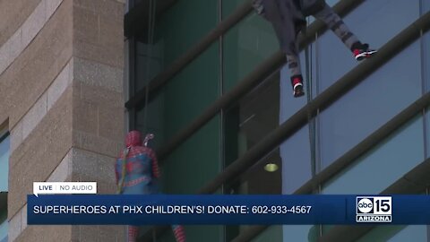 Superheroes lift spirits at Phoenix Children's Hospital