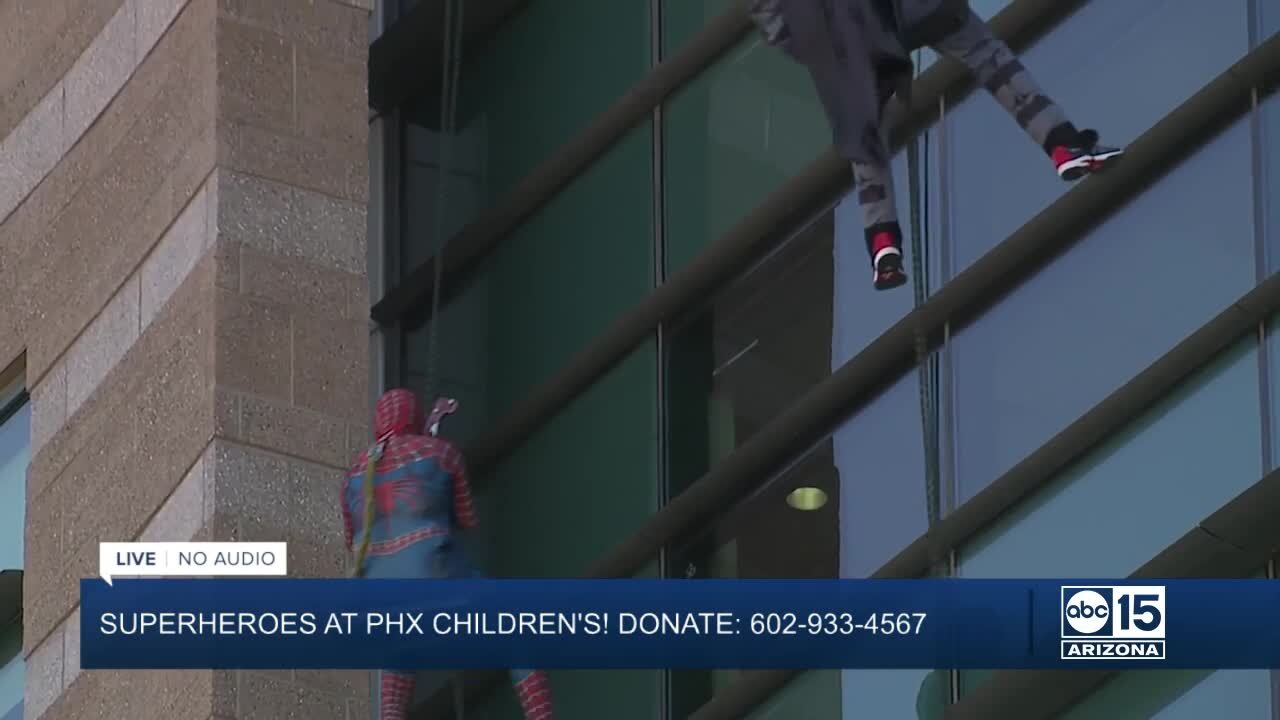 Superheroes lift spirits at Phoenix Children's Hospital