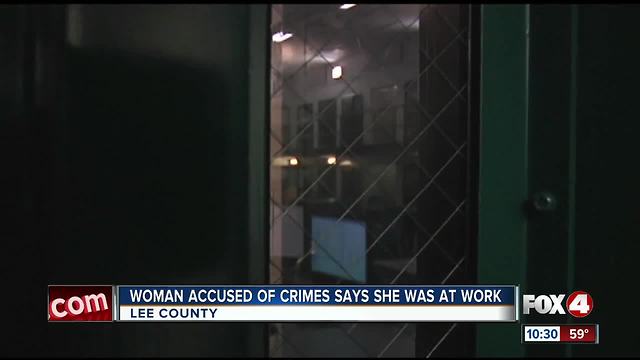 Woman accused of crimes says she was at work