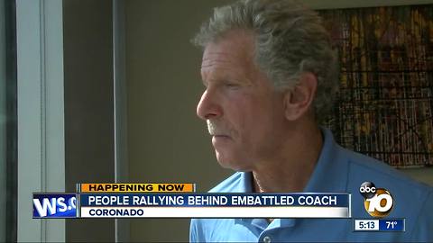 People rallying behind embattled coach