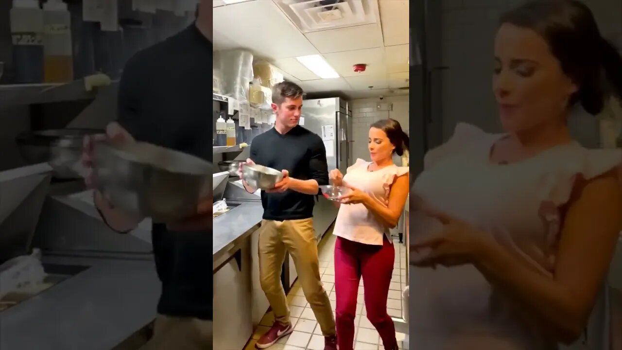 Happy Couple Dancing And Cooking