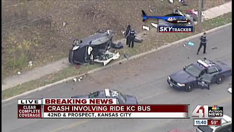 Suspects fleeing police crash into Ride KC bus, flip car onto sidewalk