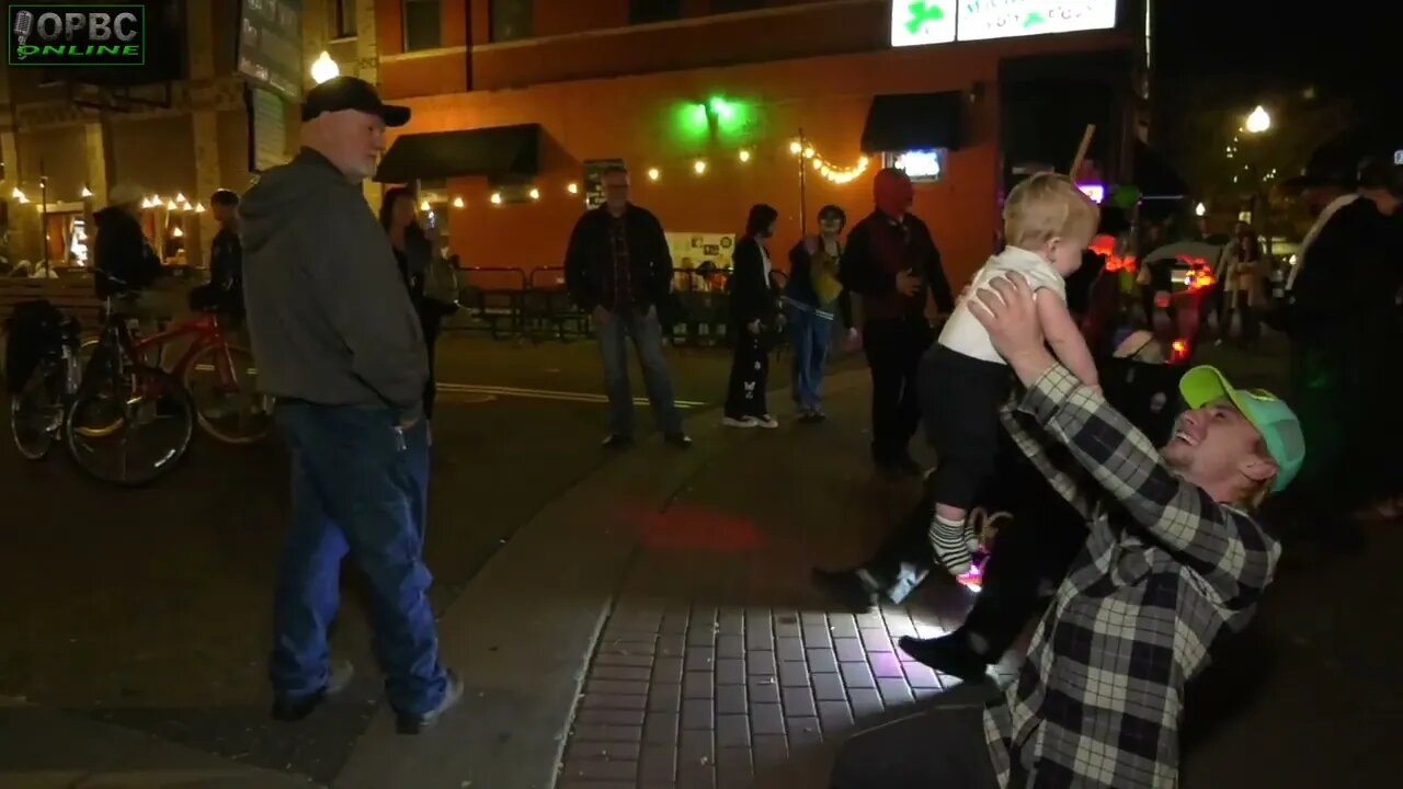 Witches Mock Preachers At Halloween Parade