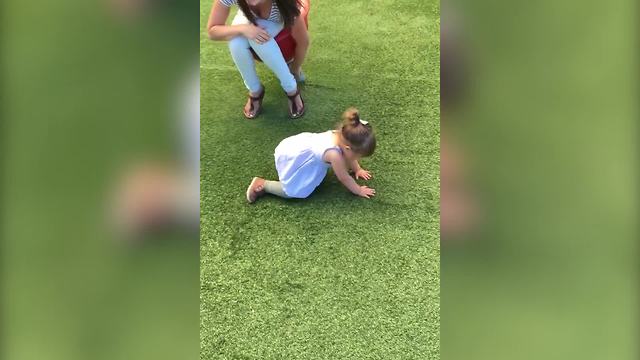 Dizzy Tot Girl Struggles To Stand Up