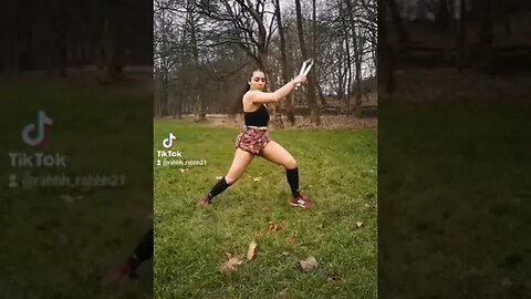 She's playing with forbidden weapons in the park #shorts #nunchuks