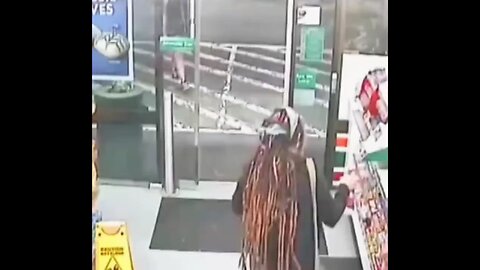 Graphic footage of Transgender attacking random people at gas station with Ax