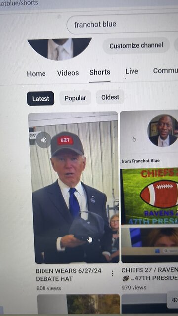 WHY BIDEN PUT ON TRUMP HAT?