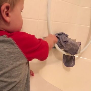 Tot Kid Tries To Fix The Shower